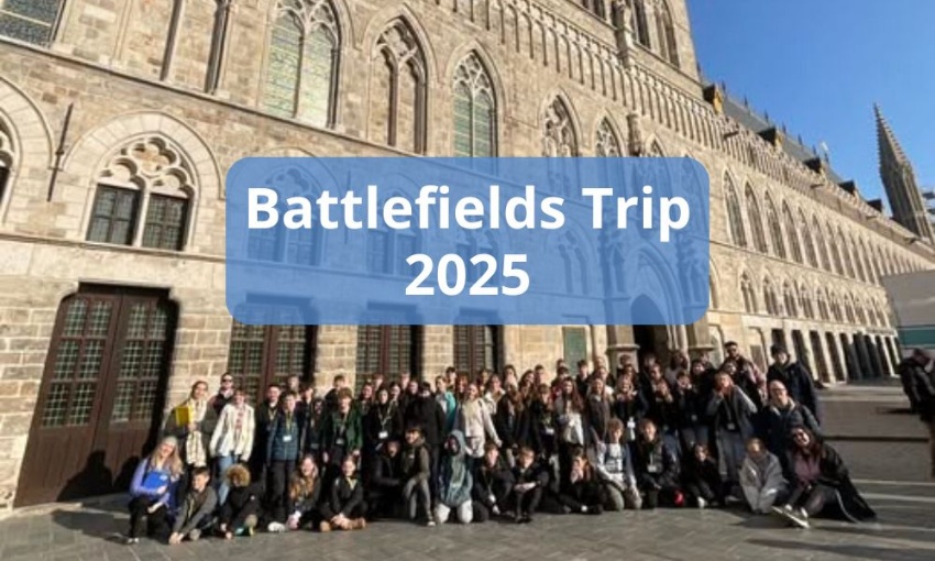 Image shows the year 8 group of pupils and teachers who went on the Battlefields trip in 2025, standing outside a church.